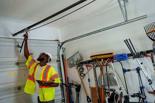 Professional Garage Door Panel Replacement technician working in Cumberland Head, NY